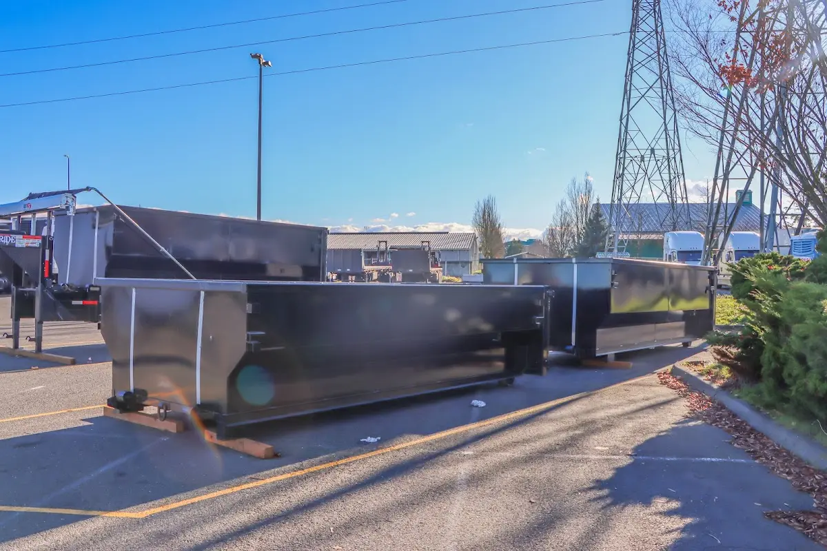 Roll-off dumpster ready for waste disposal at job site for Concrete Dumpster Rental in Silverdale